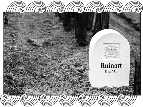 Ruinart, oldest Champagne house, stone marker in a Reims vineyard, framed with Dynamic Cellars wave design