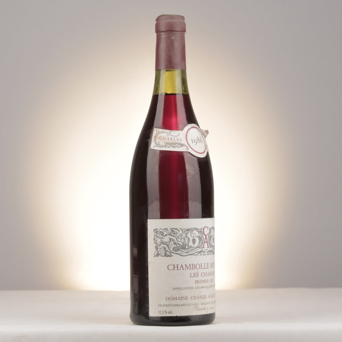 Charles Allexant et Fils Chambolle-Musigny 1er Cru Les Charmes 1986 Bottle turned right