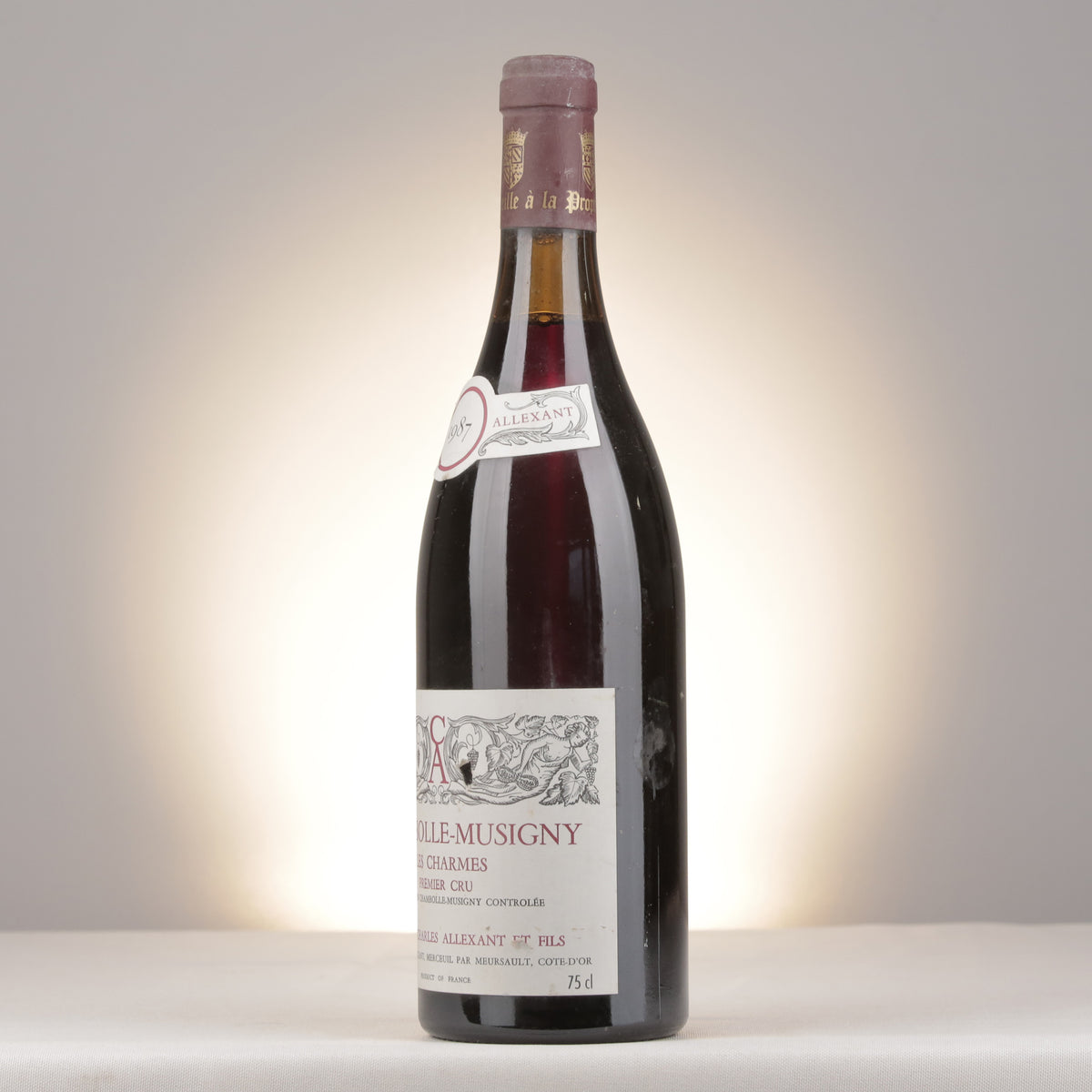 Charles Allexant et Fils Chambolle-Musigny 1er Cru Les Charmes 1987 Bottle turned left