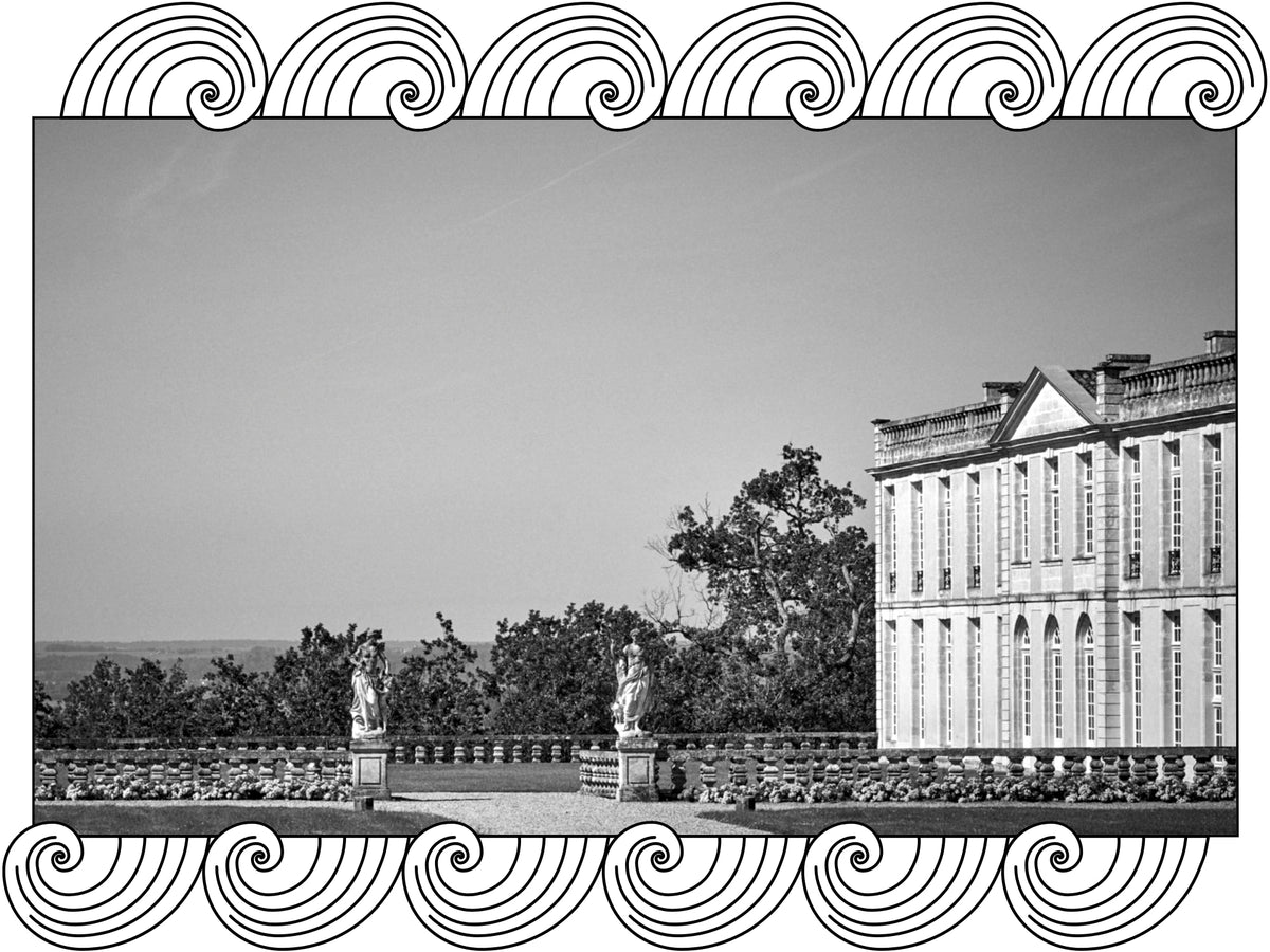 Château Laroque: façade of the estate and its terrace with statues above the park, framed with Dynamic Cellars wave design