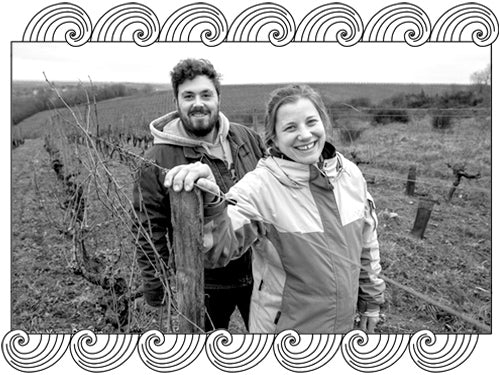 Clos des Breteches, Loire winemakers in their vineyard during winter pruning, framed with Dynamic Cellars wave design