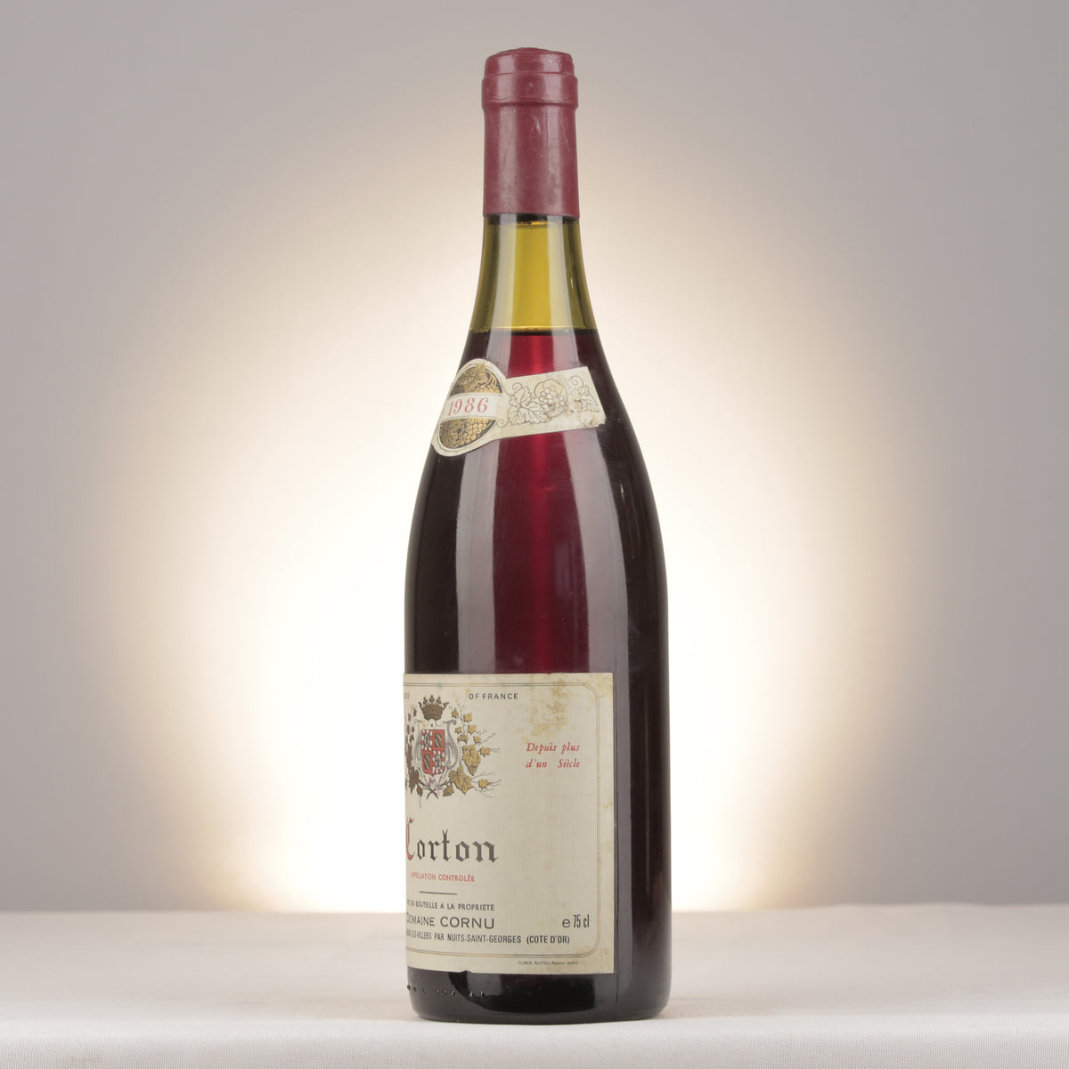 Domaine Cornu Corton Grand Cru 1986 Bottle turned left (lot fec9)