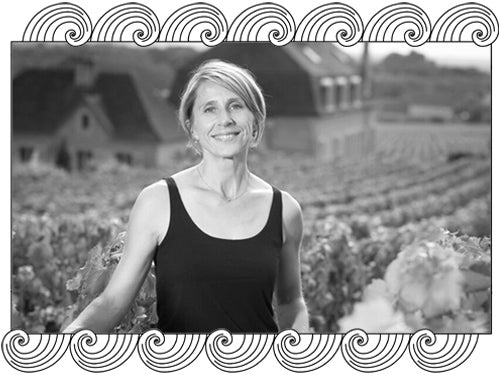 Domaine de l'Arlot winemaker among her Nuits-Saint-Georges vines, framed with Dynamic Cellars wave design
