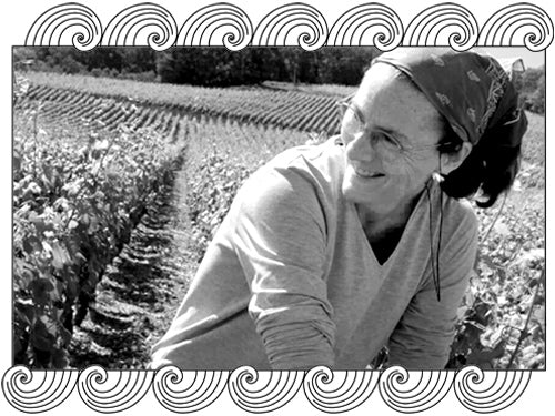 Naudin-Ferrand tending her Hautes-Côtes de Nuits vines in Burgundy, framed with Dynamic Cellars wave design