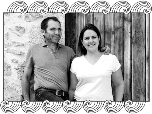 Domaine Sérol, Loire winemakers, portrait at their estate entrance, framed with Dynamic Cellars wave design