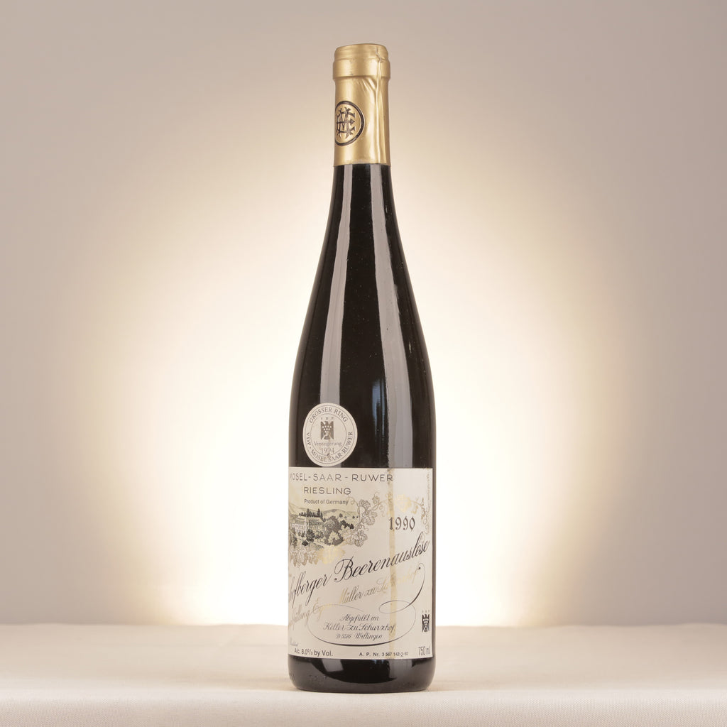 Egon Muller Scharzhofberger Riesling Beerenauslese Goldkapsel Versteigerung Mosel 1990 Bottle turned left (lot 0db7)