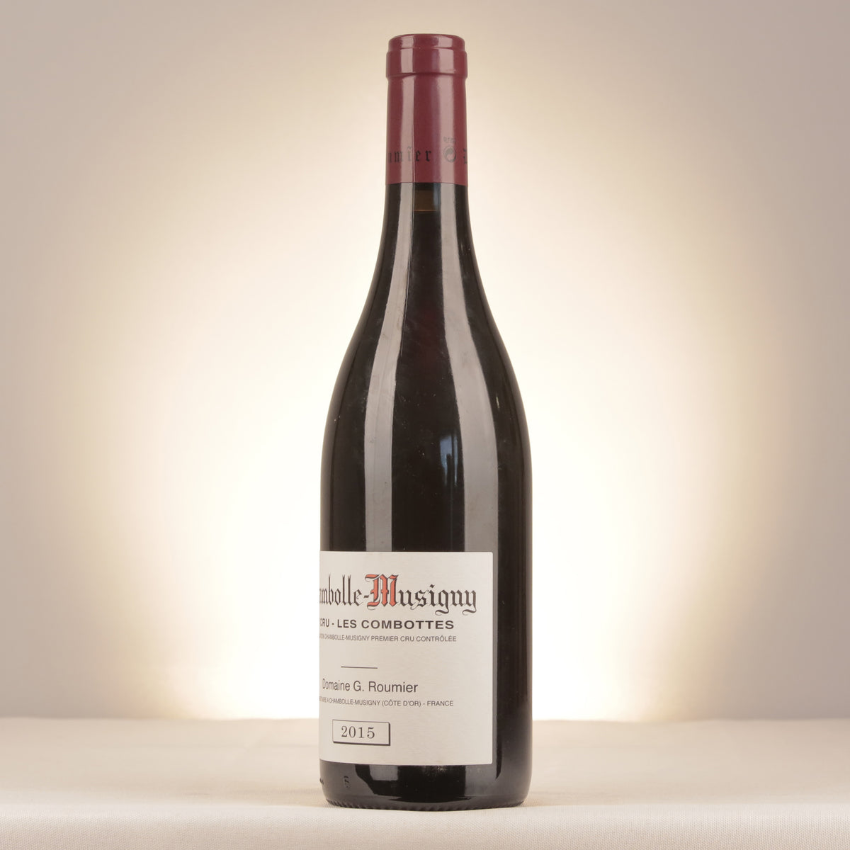 Georges Roumier Chambolle-Musigny 1er Cru Les Combottes 2015 Bottle turned left