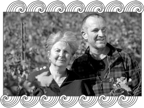 Giudicelli Muriel, Corsican winemakers, among their Poggio d'Oletta vines, framed with Dynamic Cellars wave design