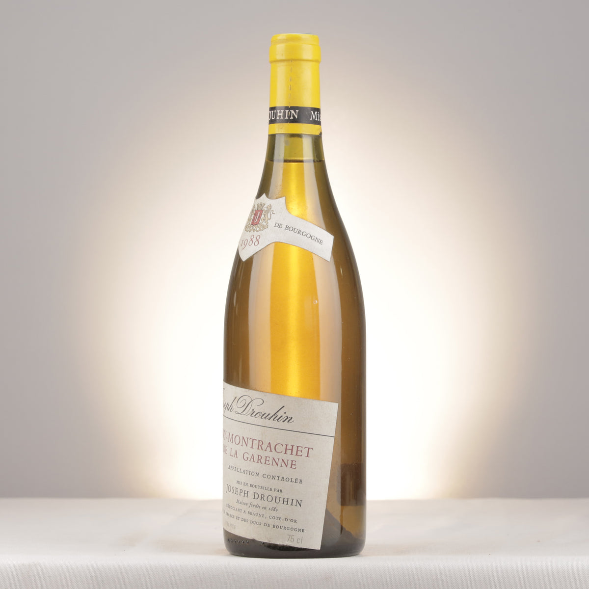 Joseph Drouhin Puligny-Montrachet 1er Cru La Garenne 1988 Bottle turned left (lot e208)