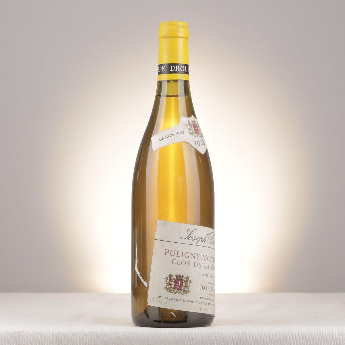 Joseph Drouhin Puligny-Montrachet 1er Cru La Garenne 1988 Bottle turned right (lot e208)