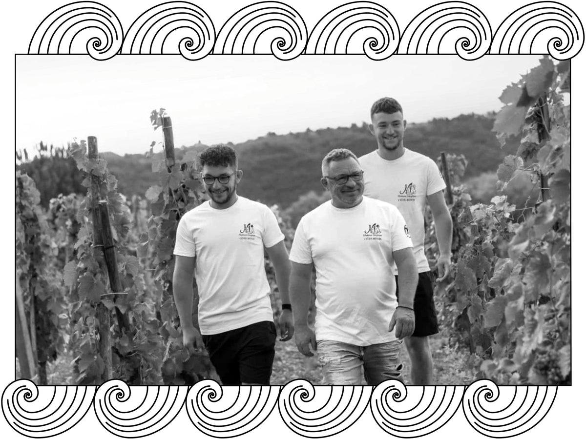 Maison Stéphan: Jean-Michel and his sons Romain and Dorian walking in the vines, framed with Dynamic Cellars wave design