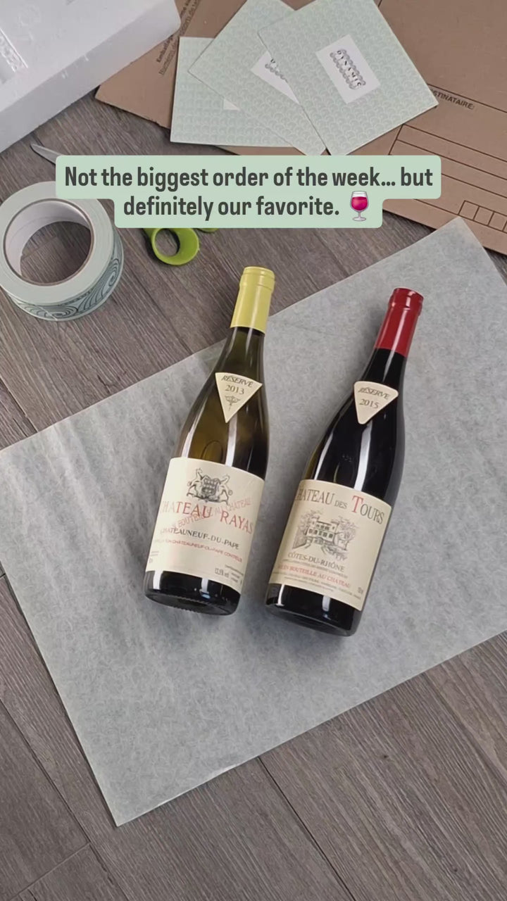 Hand-packing Château Rayas 2013 and Château des Tours Côtes du Rhône 2015 for shipping to Vilnius