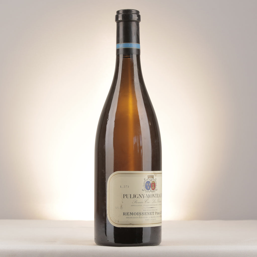 Remoissenet Père et Fils Puligny-Montrachet 1er Cru Les Folatières 1999 Bottle turned right (lot d2ad)