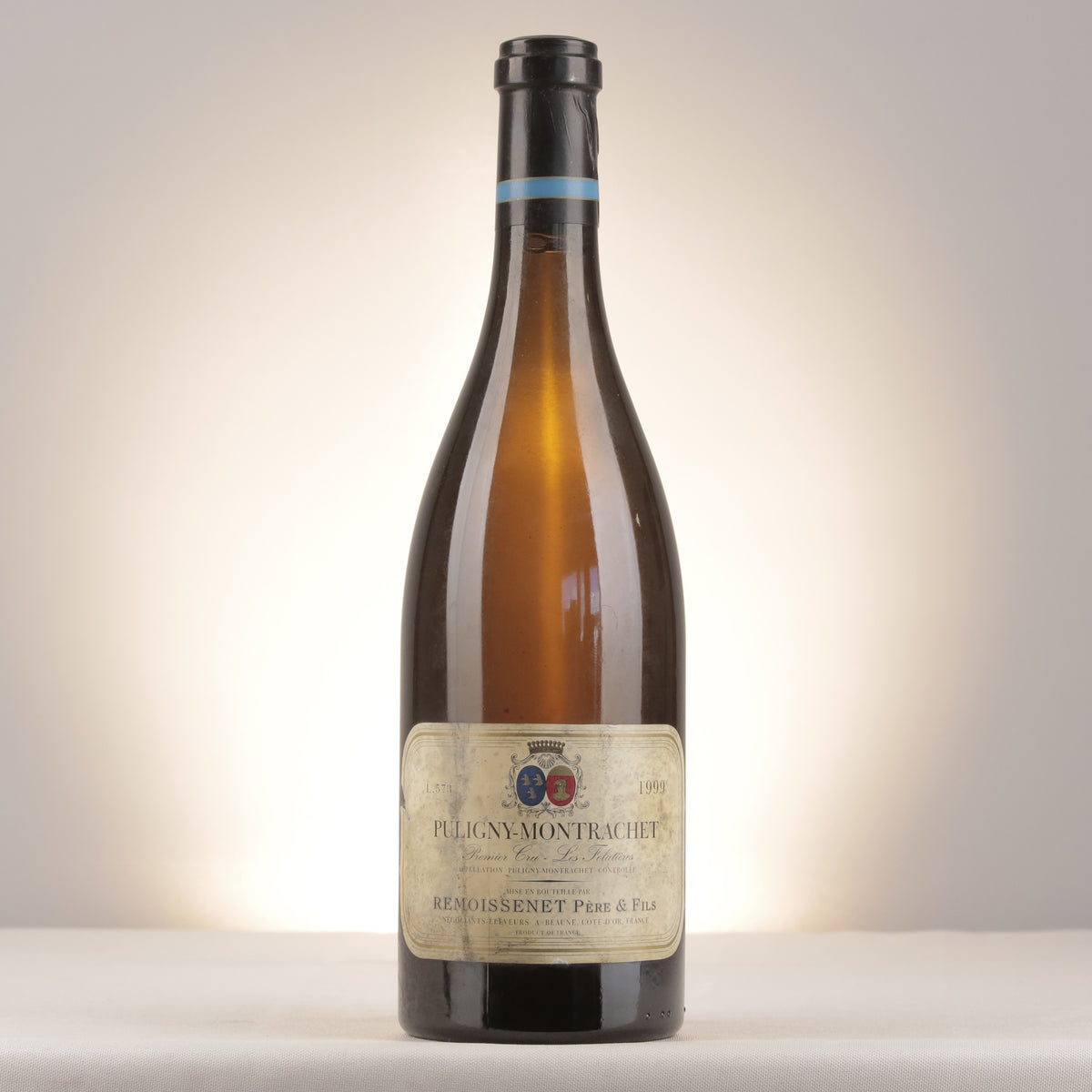 Remoissenet Père et Fils Puligny-Montrachet 1er Cru Les Folatières 1999 Bottle front (lot dda8)