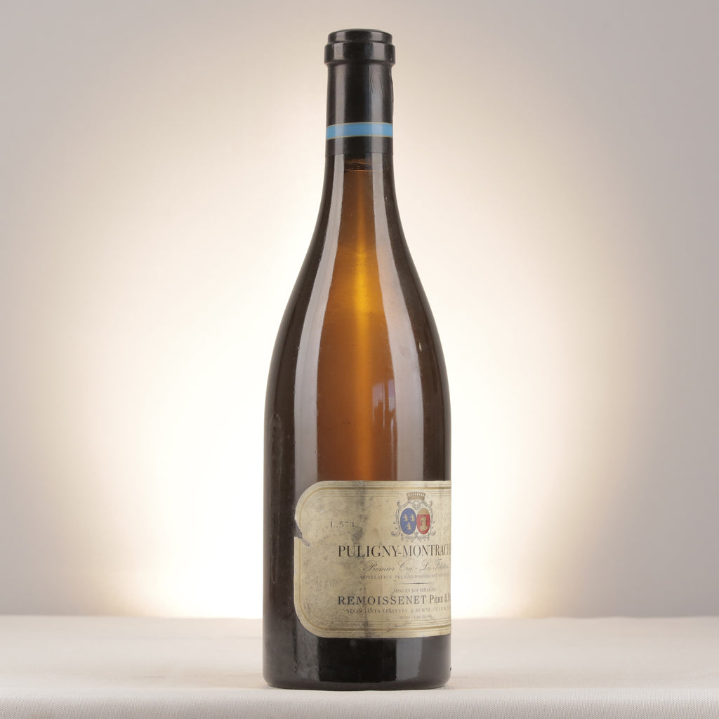 Remoissenet Père et Fils Puligny-Montrachet 1er Cru Les Folatières 1999 Bottle turned right (lot dda8)