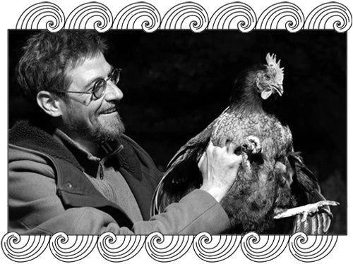 Sylvain Dittière, Saumur winemaker, holding a rooster on his estate, framed with Dynamic Cellars wave design